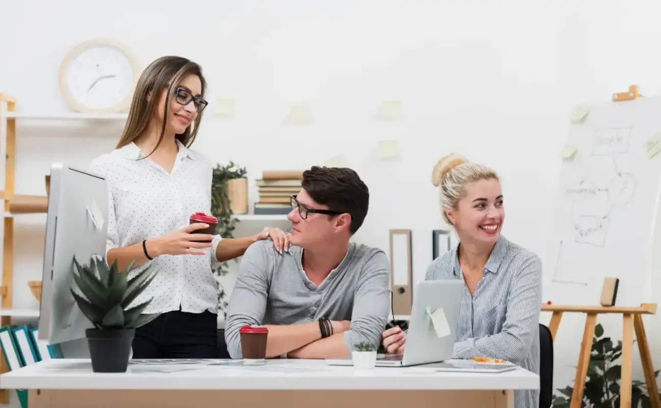 front-view-business-partners-sitting-desk (1).webp